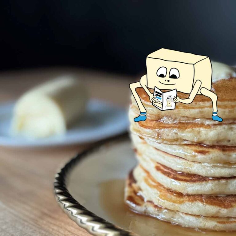 Drawing of a stick of butter reading on top of a real photo of pancakes, with a portion of homemade butter in background